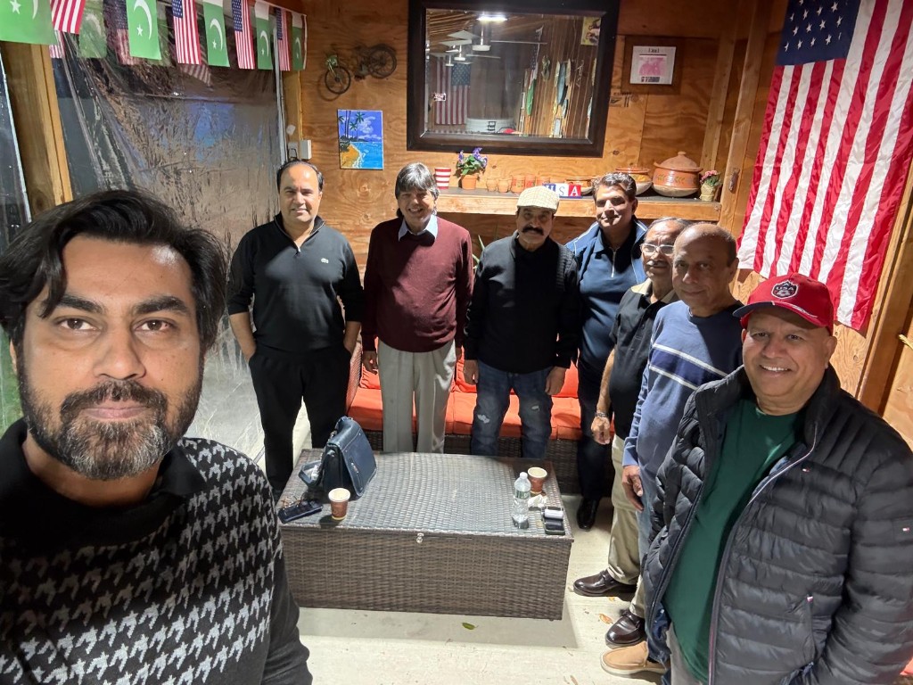 Pakistani American friends reunion with Pakistan and US flags