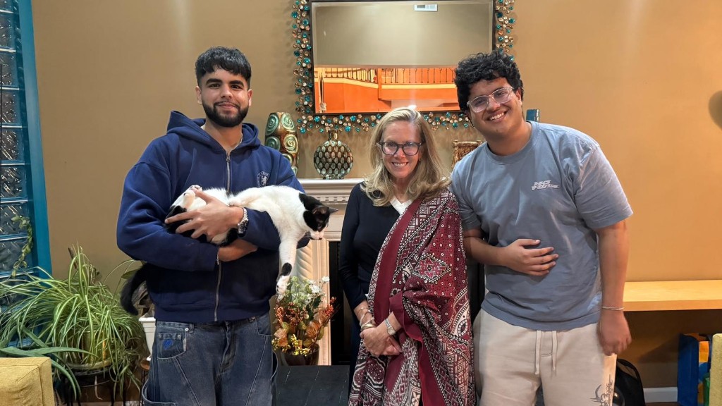 Congresswoman Laura Gillen in a Sindhi Ajrak with members of the Wasti family in New York